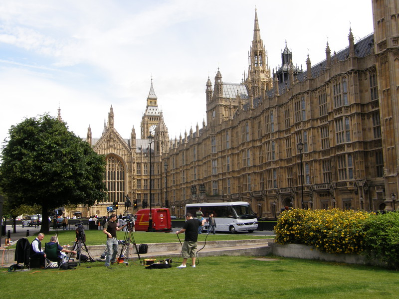 A television crew in front of the Palace of Westminster