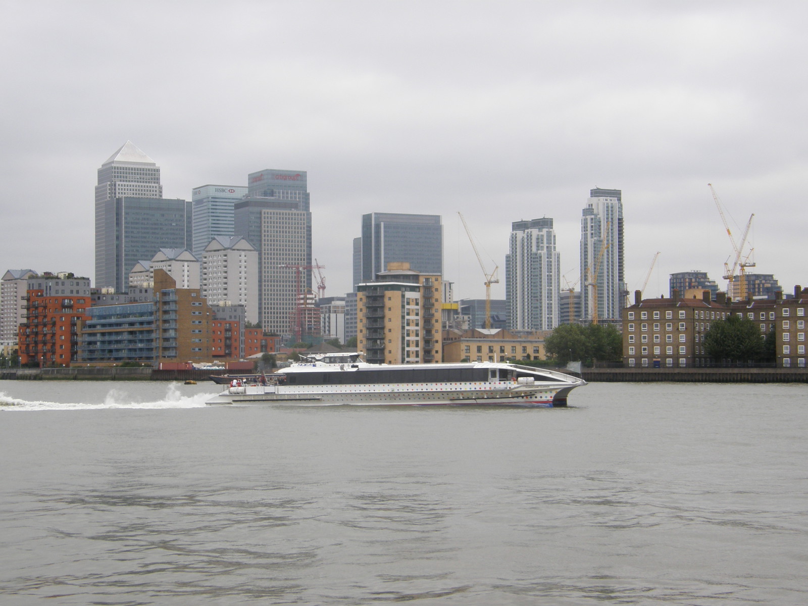 Canary Wharf and a Thames Clippers catamaran