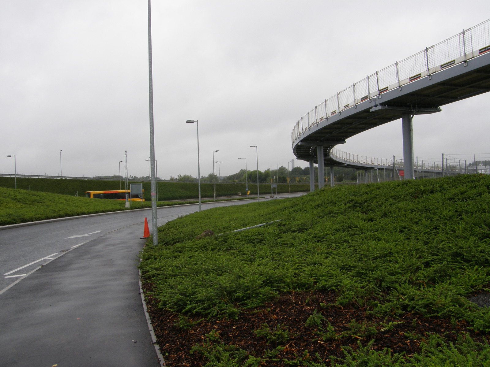 The Western Perimeter Road with the driver-less light rail system on the right