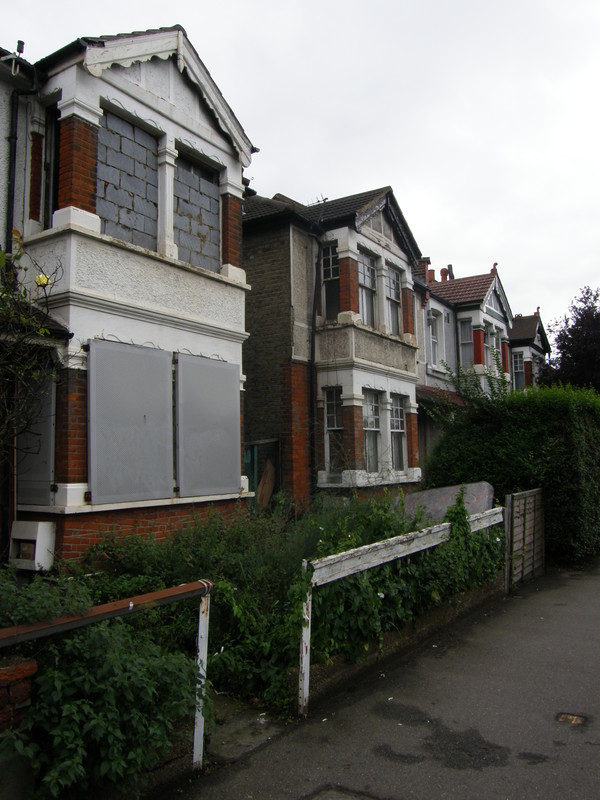 Boarded-up houses along Hangar Lane
